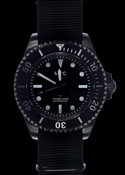 MWC 24 Jewel 1982 Pattern 300m Automatic Military Divers Watch in Black PVD with a Sapphire Crystal on a NATO Webbing Strap (Non Date Version)