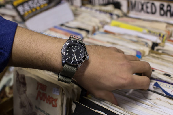 MWC 24 Jewel 300m Automatic Military Divers Watch with Sapphire Crystal and Ceramic Bezel on a Matching Stainless Steel Bracelet