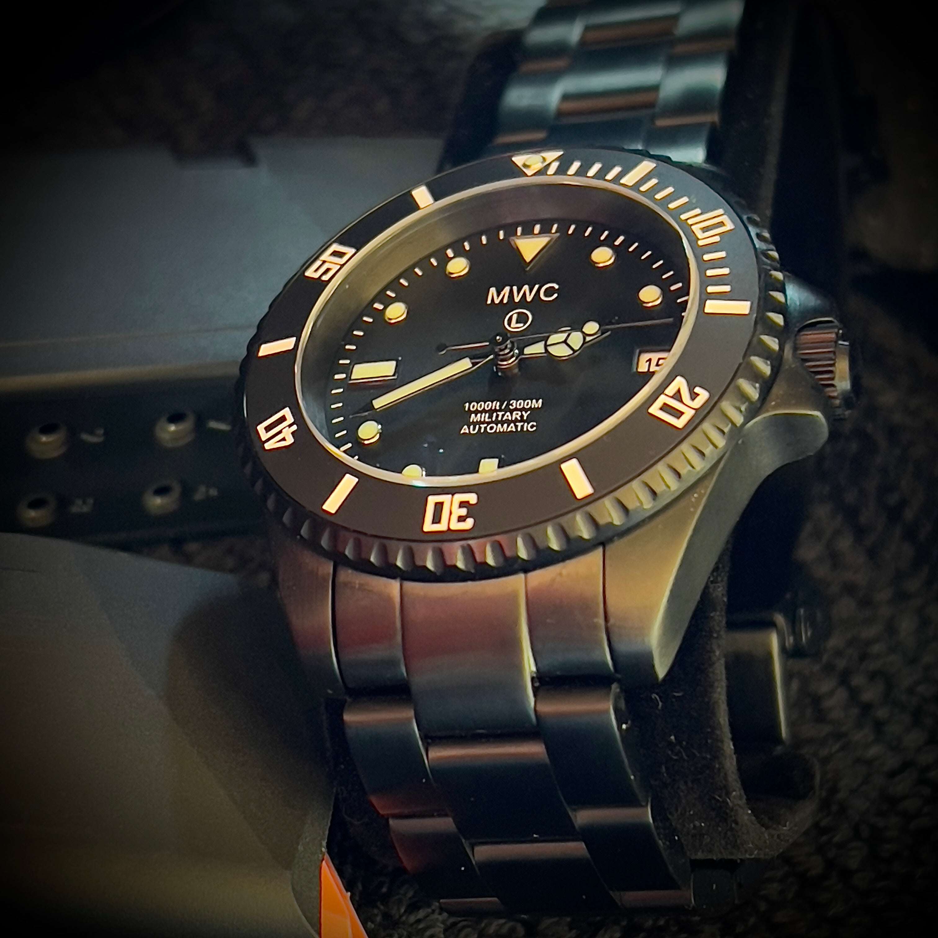 MWC 24 Jewel 300m Automatic Military Divers Watch with Sapphire Crystal and Ceramic Bezel on a Matching Stainless Steel Bracelet
